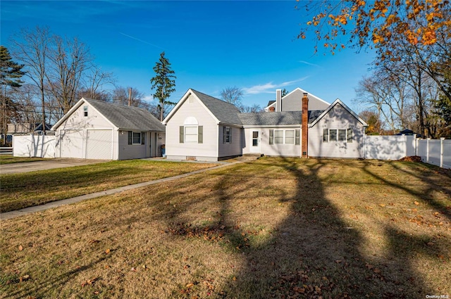 rear view of house with a lawn