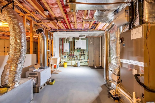 basement with tankless water heater and sink