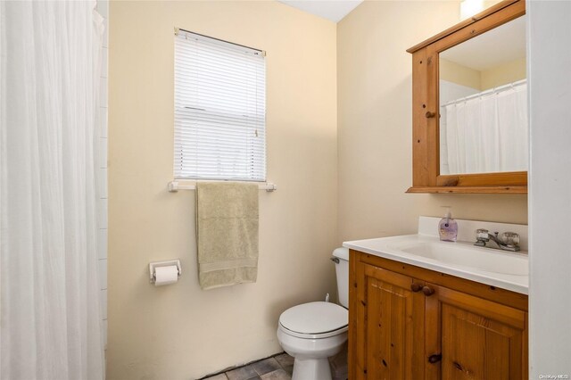 1400 Aldrich Ln, Laurel, NY 11948 - bathroom with vanity and toilet