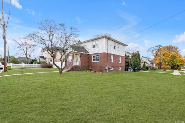 view of home's exterior featuring a lawn