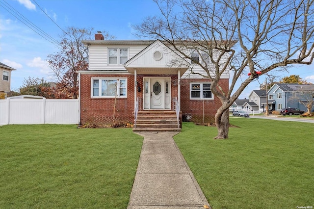 view of front of house with a front lawn