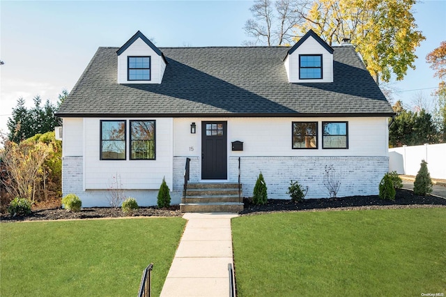 view of front of house with a front lawn