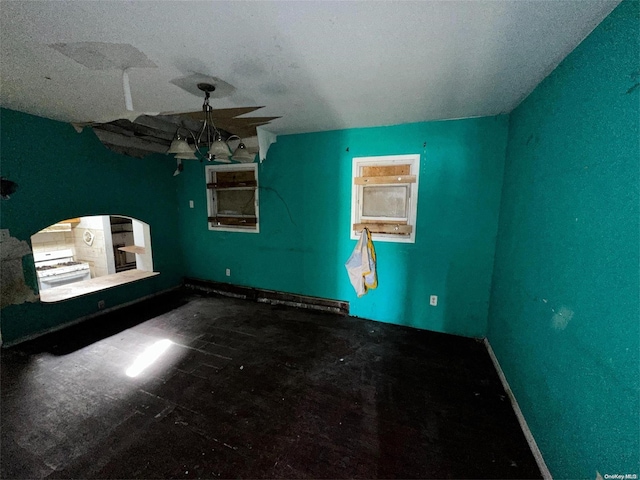 spare room with a textured ceiling