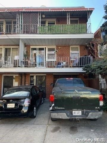 view of property featuring a balcony