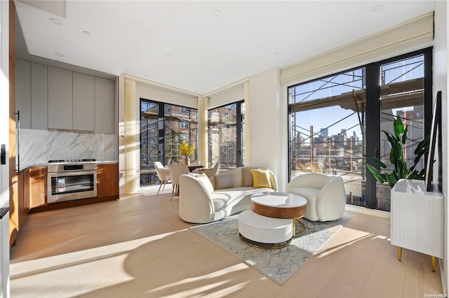 31-16 21st St Unit 3C, Astoria, NY 11106 - living area with a sunroom