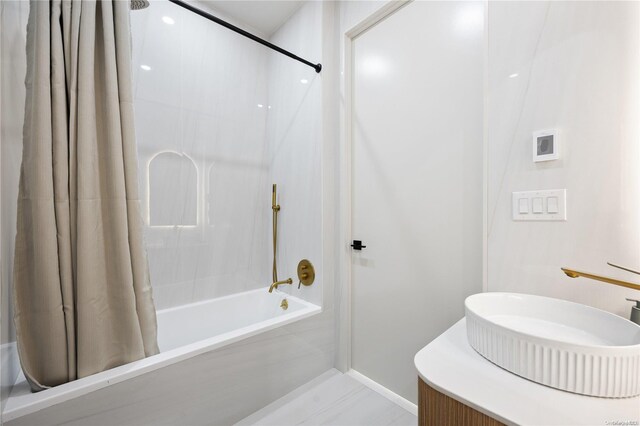 31-16 21st St Unit 3C, Astoria, NY 11106 - full bath with shower / bath combination with curtain, vanity, and baseboards