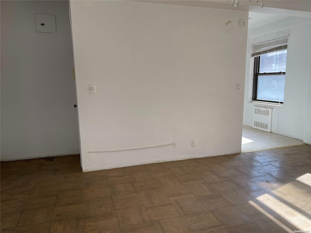 99-40 63rd Rd Unit 5A, Rego Park, NY 11374 - unfurnished room featuring radiator