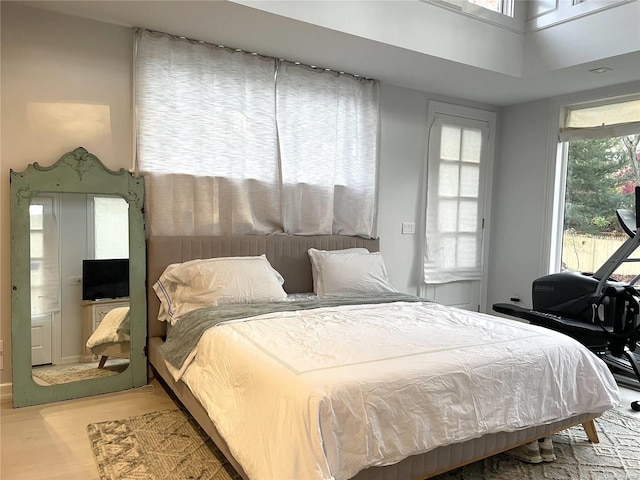 bedroom featuring hardwood / wood-style floors