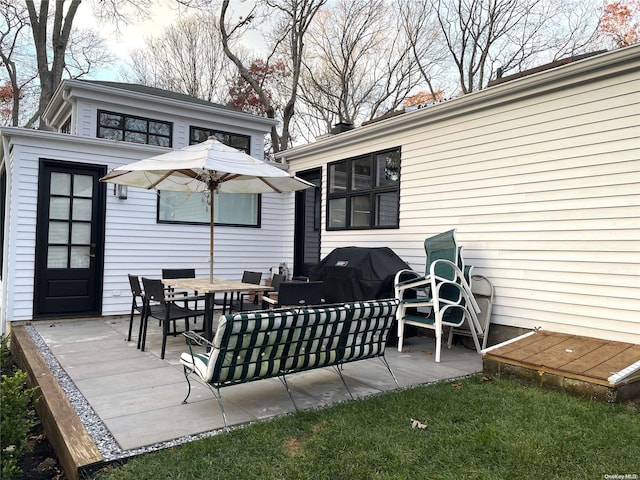 wooden deck with an outdoor hangout area