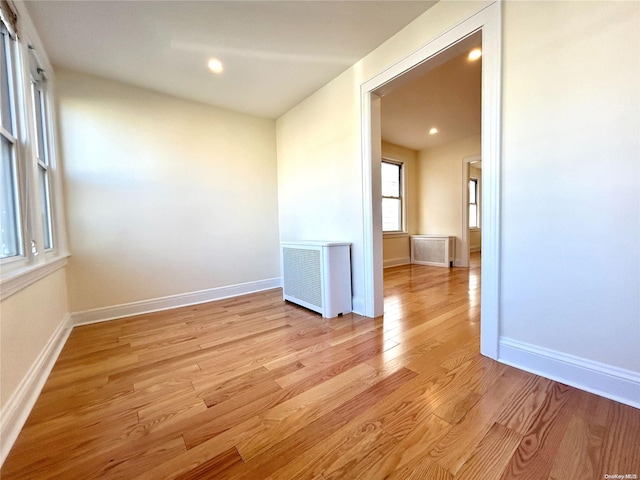 unfurnished room featuring light hardwood / wood-style floors