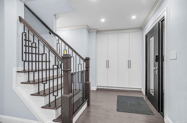 foyer entrance with hardwood / wood-style floors