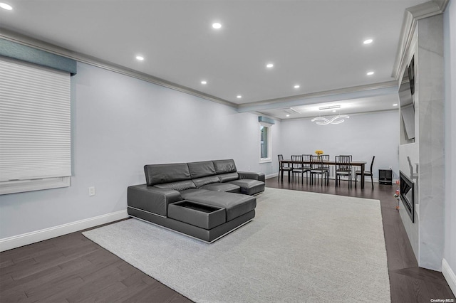 living room featuring crown molding and dark wood-type flooring