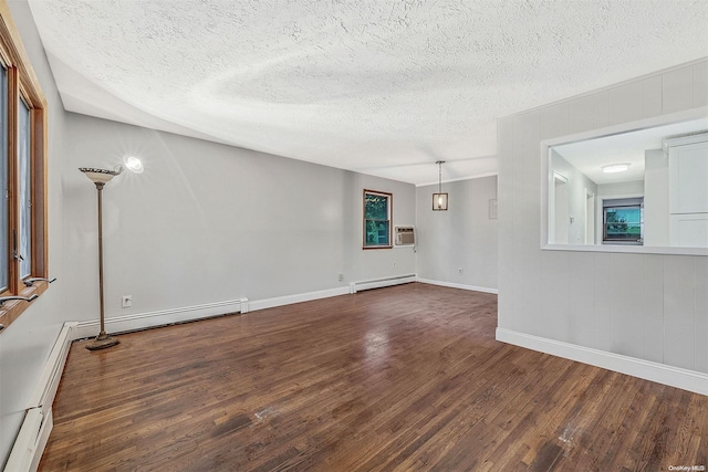 unfurnished living room featuring a textured ceiling, dark wood-type flooring, and a baseboard radiator