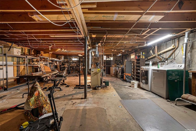 basement with washing machine and dryer