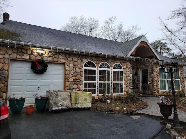 view of front of home with a garage