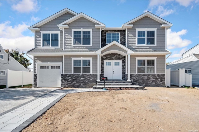 craftsman-style home featuring a garage