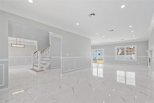 empty room featuring ornamental molding