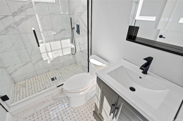 bathroom featuring tile patterned floors, vanity, toilet, and an enclosed shower