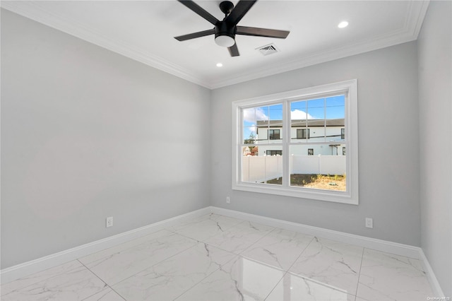 spare room with ceiling fan and crown molding