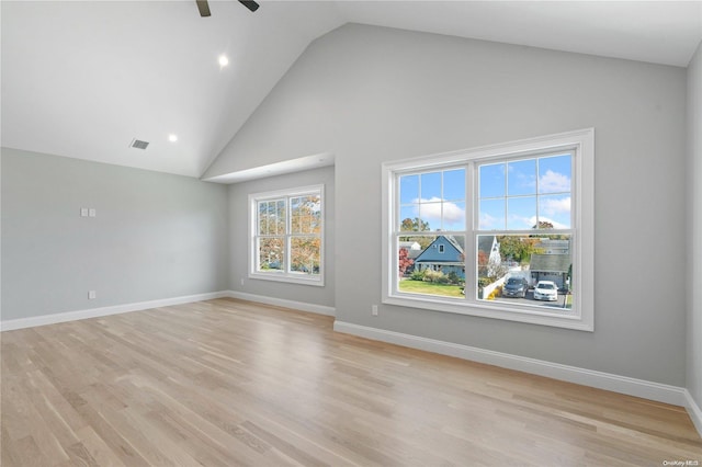 interior space with high vaulted ceiling, light hardwood / wood-style flooring, and ceiling fan