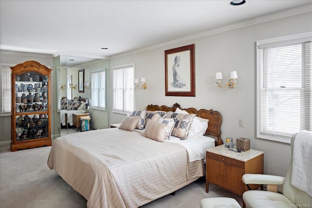 carpeted bedroom featuring crown molding