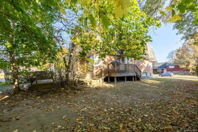 view of yard with a deck