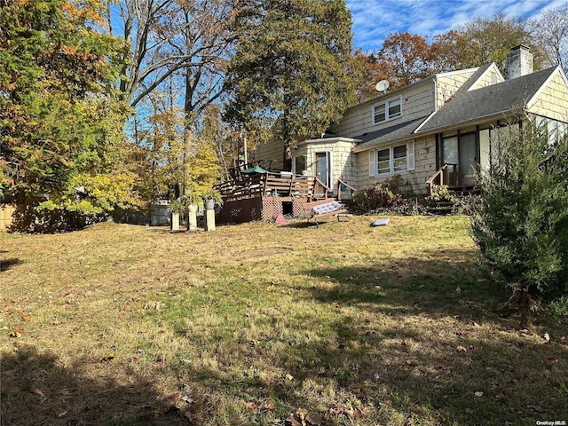 view of yard featuring a deck