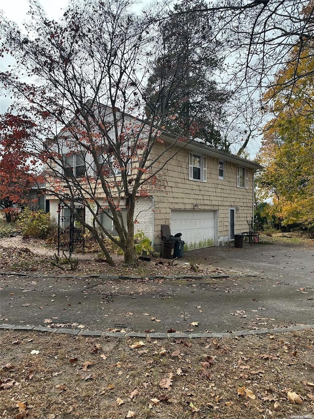 view of home's exterior with a garage