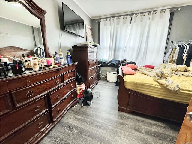 bedroom featuring hardwood / wood-style floors