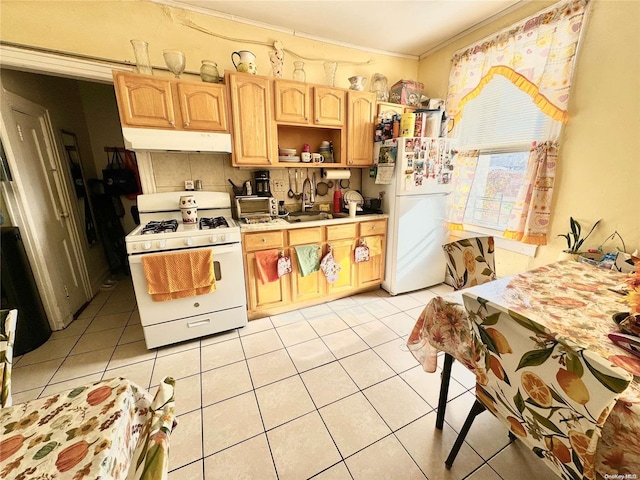 kitchen with light brown cabinets, white appliances, crown molding, sink, and light tile patterned flooring