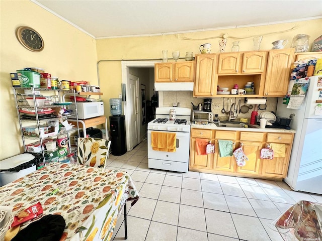 kitchen with light brown cabinets, sink, crown molding, white appliances, and light tile patterned floors