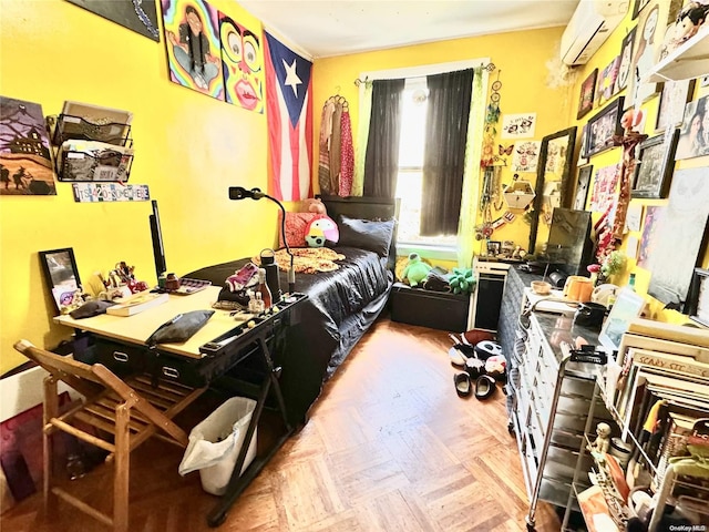 bedroom with parquet flooring and an AC wall unit