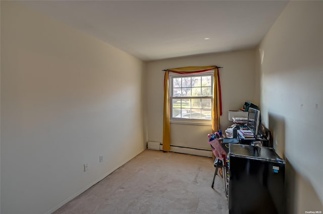 office with light colored carpet and a baseboard heating unit