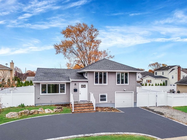 tri-level home with a garage