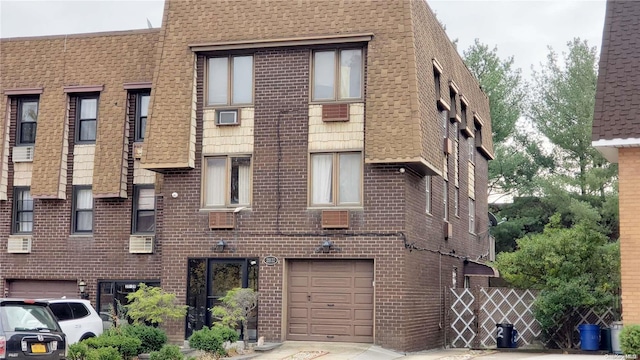 view of building exterior with a garage