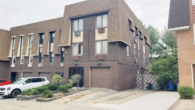 view of building exterior with a garage