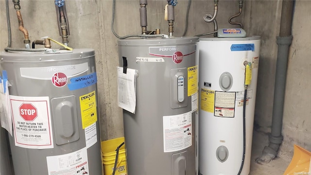 utility room featuring water heater