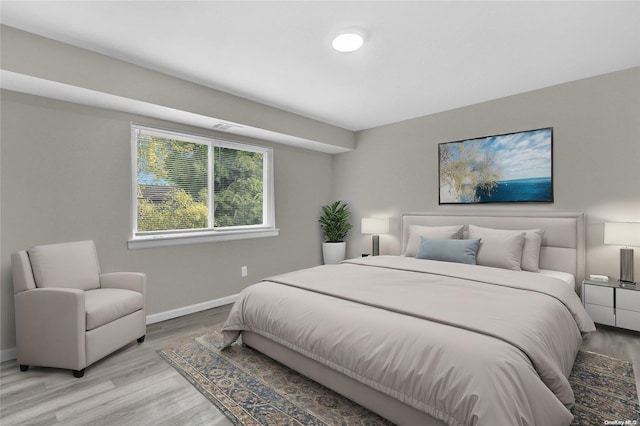 bedroom featuring light hardwood / wood-style flooring