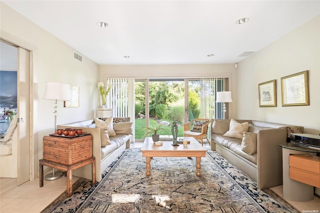 living room with light tile patterned floors