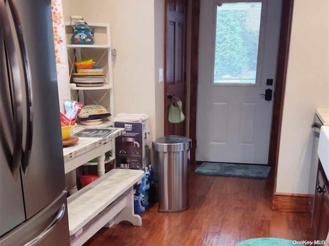 doorway to outside with dark hardwood / wood-style floors