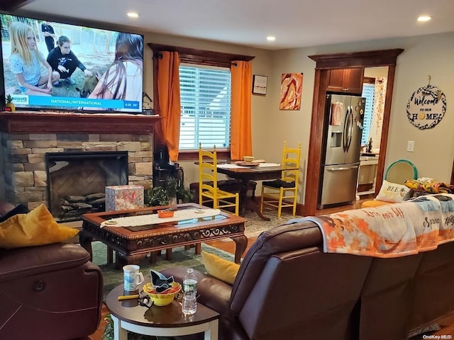 living room featuring a fireplace