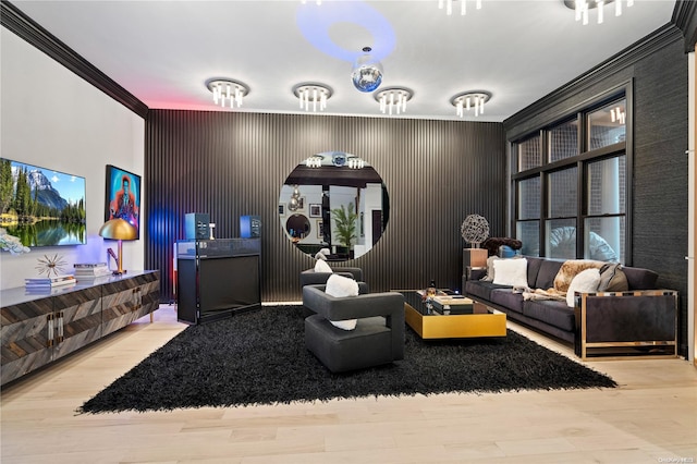 living room featuring light hardwood / wood-style floors and crown molding