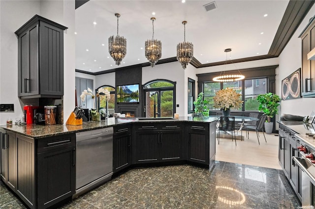 kitchen featuring crown molding, sink, dark stone countertops, appliances with stainless steel finishes, and decorative light fixtures