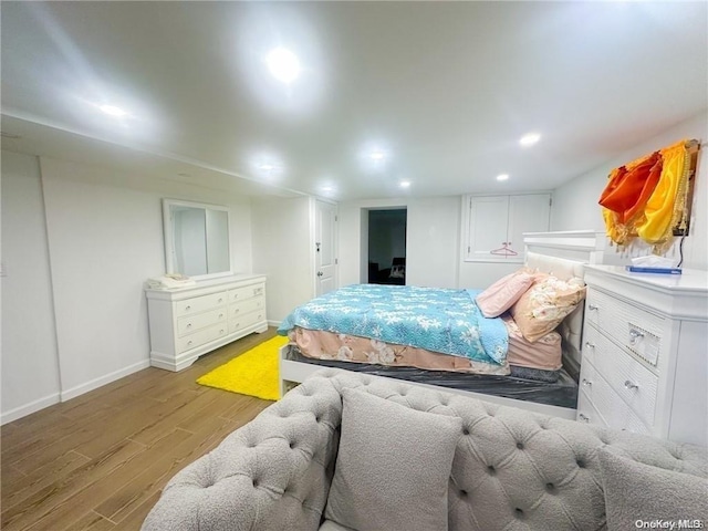 bedroom with light wood-type flooring