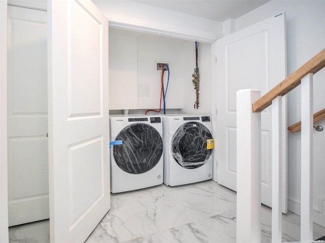 laundry room with separate washer and dryer