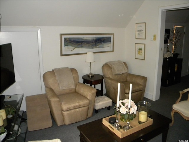 living room with vaulted ceiling