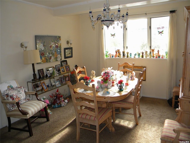 dining room featuring an inviting chandelier, carpet, and ornamental molding