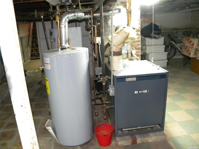 utility room featuring water heater