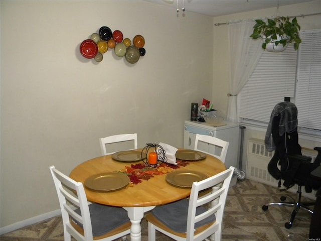 dining area with radiator heating unit