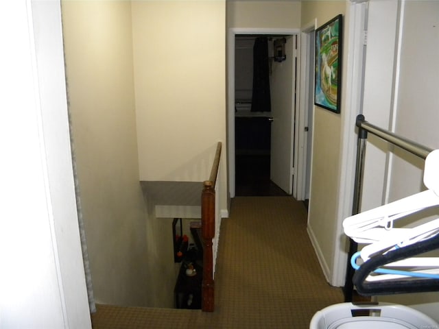 hallway featuring carpet flooring